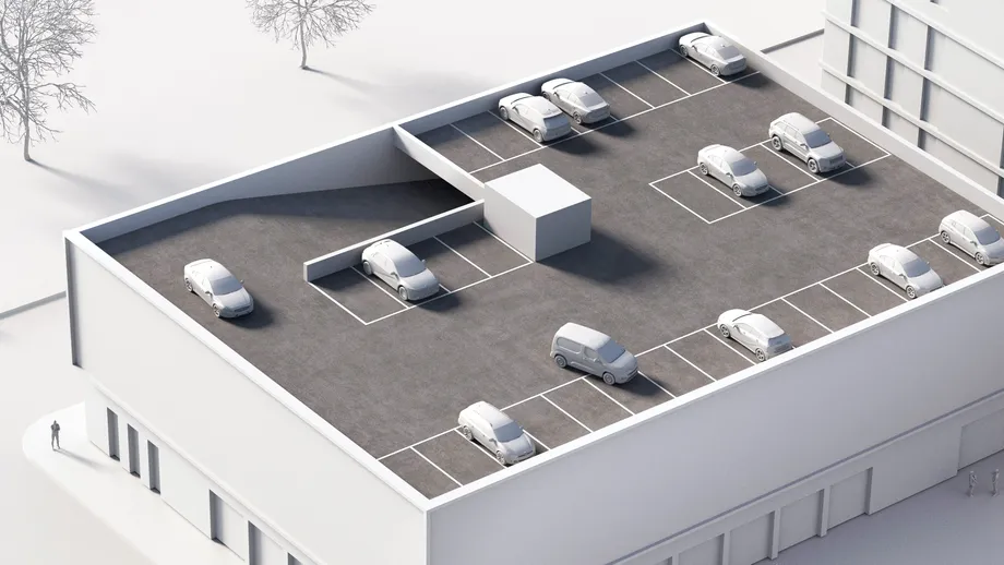 Valkoinen arkkitehtuurinen malli kattoparkkipaikasta